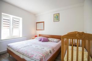 Posteľ alebo postele v izbe v ubytovaní Villa Natalija + 27 fotografií
