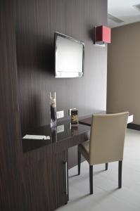 TV a/nebo společenská místnost v ubytování Hotel Ansharius - Adults only