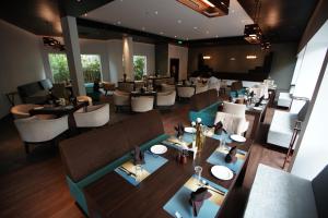 an overhead view of a restaurant with tables and chairs at The Terrace by Ladder Mgd by Citrine in Trivandrum