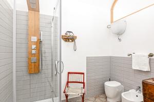 Ванна кімната в Palazzo dei Normanni Stylish Apartment