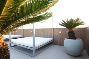 Postel nebo postele na pokoji v ubytování Hotel Bossa Nova Cabo Frio