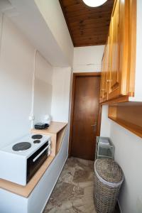 Kuchyňa alebo kuchynka v ubytovaní LEFKADA CENTRAL SQUARE APARTMENT