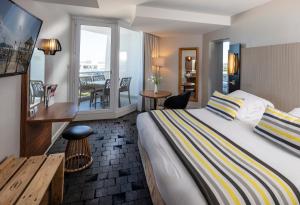 Thalazur Port-Camargue - Hotel & Spa客房内的一张或多张床位