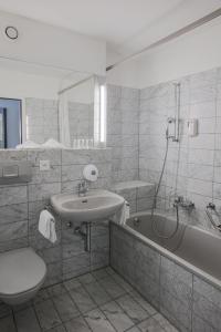 Ett badrum på Hotel Restaurant Seegarten