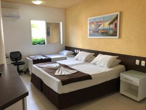 Cama ou camas em um quarto em Hotel Des Basques