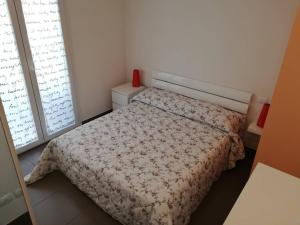 Letto o letti in una camera di Appartamento Fabbri a Rivabella di Rimini