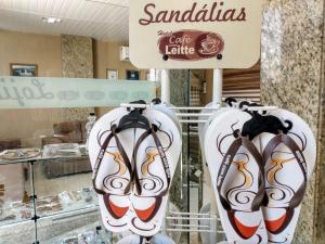 Pousada Café Com Leitte的证书、奖牌、标识或其他文件
