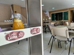 Pousada Café Com Leitte餐厅或其他用餐的地方