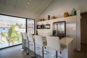 Cucina o angolo cottura di La Royal Penthouse Apartment Jan Thiel