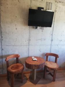 TV a/nebo společenská místnost v ubytování Hotel Amun