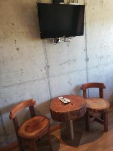 TV a/nebo společenská místnost v ubytování Hotel Amun