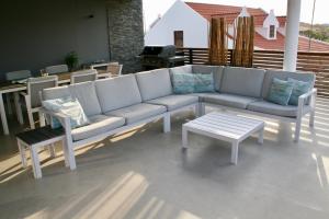 Area soggiorno di La Royal Penthouse Apartment Jan Thiel