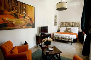 Postel nebo postele na pokoji v ubytování Riad Idra + 37 fotografií