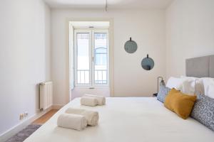 Cama o camas de una habitación en Casa Portuguesa Carmo