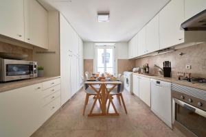 Una cocina o zona de cocina en Casa Portuguesa Carmo