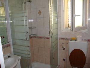 Koupelna v ubytování Apartments Villa Damir + 73 fotografií