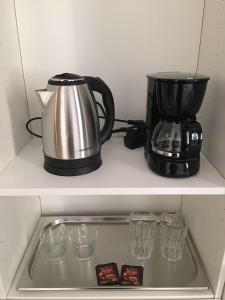 Príslušenstvo na prípravu kávy alebo čaju v ubytovaní Orion
