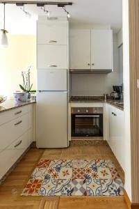 Kuchnia lub aneks kuchenny w obiekcie Noia Compostellae Beach