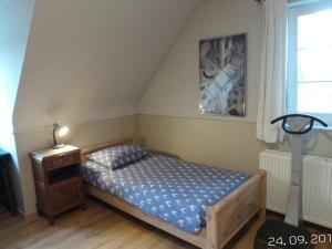 מיטה או מיטות בחדר ב-Villa De Ruiter