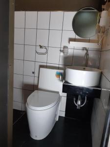 Koupelna v ubytování Capsule Hostel Chiangkhan