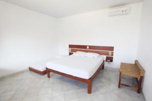 Cama ou camas em um quarto em Pousada Vila Cajuína - Luís Correia