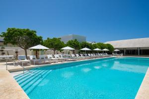 Bazén v ubytování Meliá Punta Cana Beach Wellness Inclusive - Adults only nebo v jeho okolí