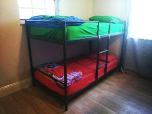 a couple of bunk beds in a room at Miami Cheapest Place in Miami