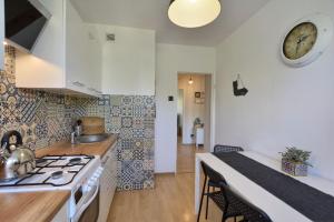 Kuchyňa alebo kuchynka v ubytovaní Apartament Dzień Dobry 2