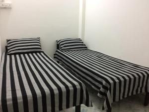 Postel nebo postele na pokoji v ubytování RR House