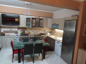 Kuchyň nebo kuchyňský kout v ubytování SeaSide Apartment Rio