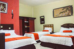 Katil atau katil-katil dalam bilik di El Patio de Don Moncho