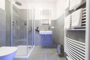 Koupelna v ubytování Hotel Schwarzer Adler Jever