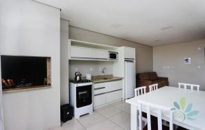 Kuchyň nebo kuchyňský kout v ubytování Residencial Bela Morada