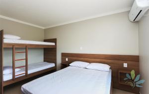 Postel nebo postele na pokoji v ubytování Residencial Bela Morada