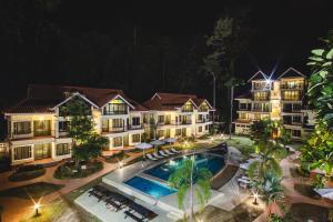 an aerial view of a resort at night at Anjungan Beach Resort in Pangkor