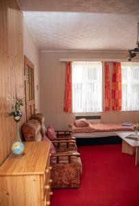 Posteľ alebo postele v izbe v ubytovaní Apartmány U Kocoura pod Klínovcem