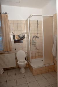 Kúpeľňa v ubytovaní Apartmány U Kocoura pod Klínovcem