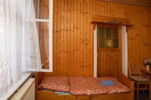 Posteľ alebo postele v izbe v ubytovaní Apartmány U Kocoura pod Klínovcem