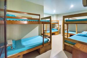 Postel nebo postele na pokoji v ubytování Boracay Backpackers