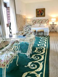 Ένα ή περισσότερα κρεβάτια σε δωμάτιο στο La Casa del Jabonero