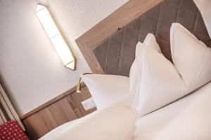 Posteľ alebo postele v izbe v ubytovaní Hotel Serles