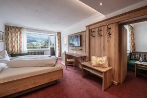 Posteľ alebo postele v izbe v ubytovaní Hotel Serles