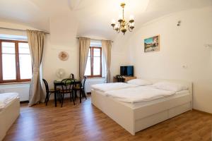 Postel nebo postele na pokoji v ubytování Guesthouse Stari Mayr