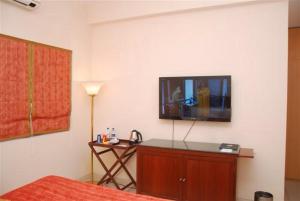 A television and/or entertainment centre at The Lalit Traveller Khajuraho