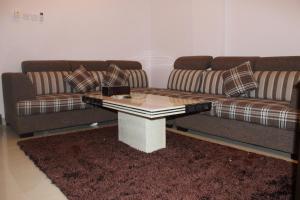 Posezení v ubytování Horizon Hotel Apartments - الأفق للشقق الفندقية