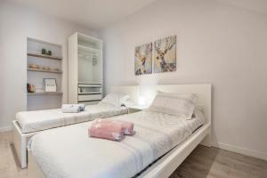 Cama o camas de una habitación en Lovely and bright apartment in the heart of Banyoles
