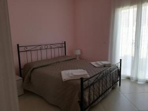 Posteľ alebo postele v izbe v ubytovaní L'elicriso B&B