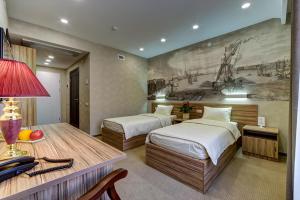 Кровать или кровати в номере Отель Shouyuan 