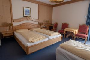Postel nebo postele na pokoji v ubytování Brückenwirt