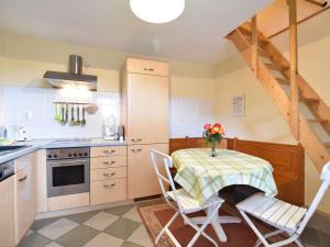 Η κουζίνα ή μικρή κουζίνα στο Ferienhaus in Elmenhorst an der Ostseeküste